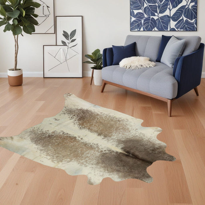 5' x 7' Cowhide Hand Knotted Area Rug - Brown And White
