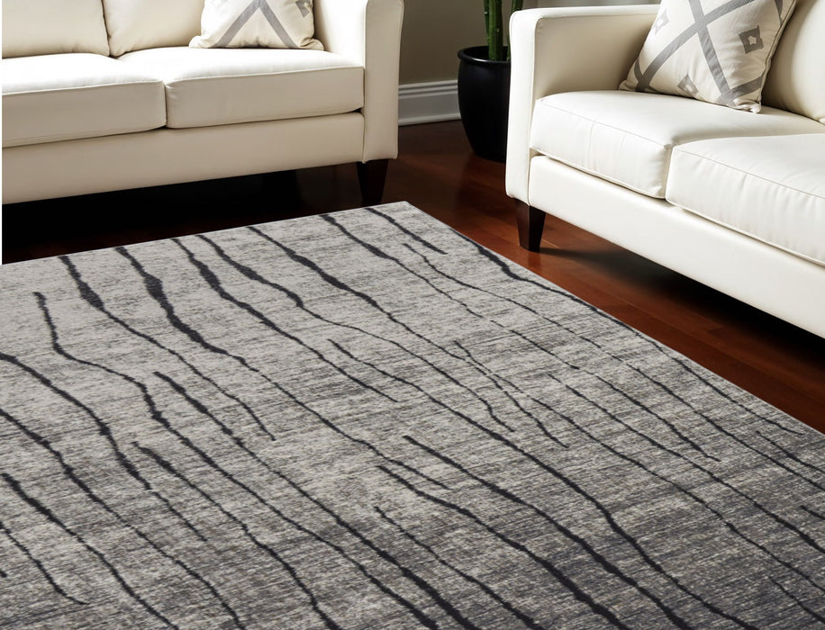 7' X 10' Abstract Power Loom Area Rug - Gray And Black