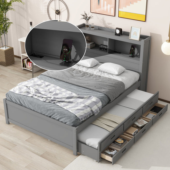 Gray Giga full size platform bed with trundle, built-in shelves, drawers, and USB ports, shown with mattress and bedding.