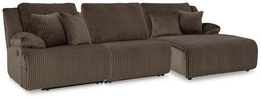 Signature Design by Ashley 3-piece reclining sectional sofa with plush cushions and wide armrests in a modern living room setting.