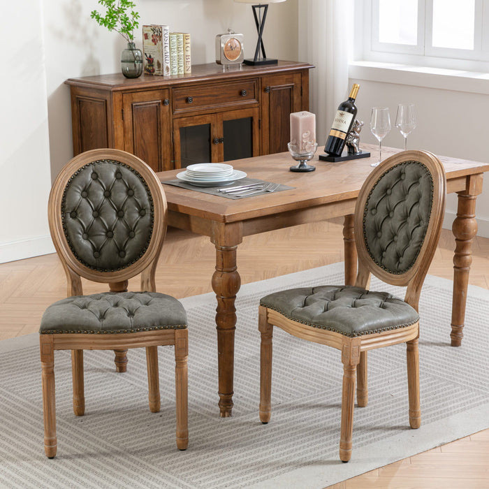Set of Giga French style solid wood dining chairs with antique painting, nailhead trim, and wood legs, featuring elegant buckle decoration.