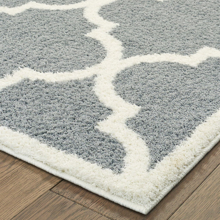 6.6' x 9.5' Geometric Shag Power Loom Stain Resistant Polyester Area Rug - Grey And Ivory
