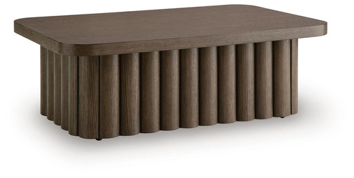 Signature Design by Ashley Darimore rectangular cocktail table with a sleek wooden finish and modern design.
