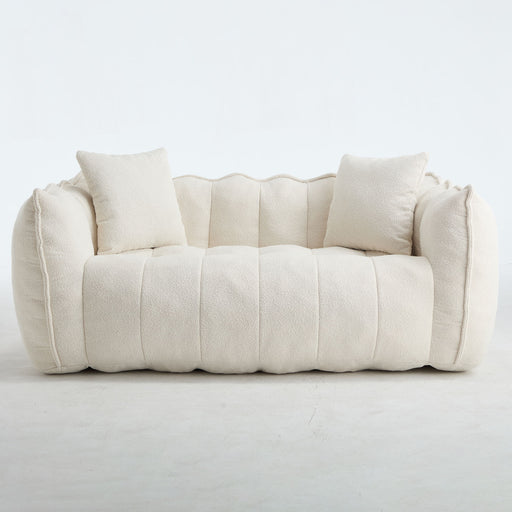 Giga cozy beanbag chair with high resilience foam core, designed for two, in a soft, plush fabric for comfortable seating.