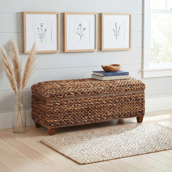 CoasterEssence Laughton hand-woven banana leaf storage bench in amber finish