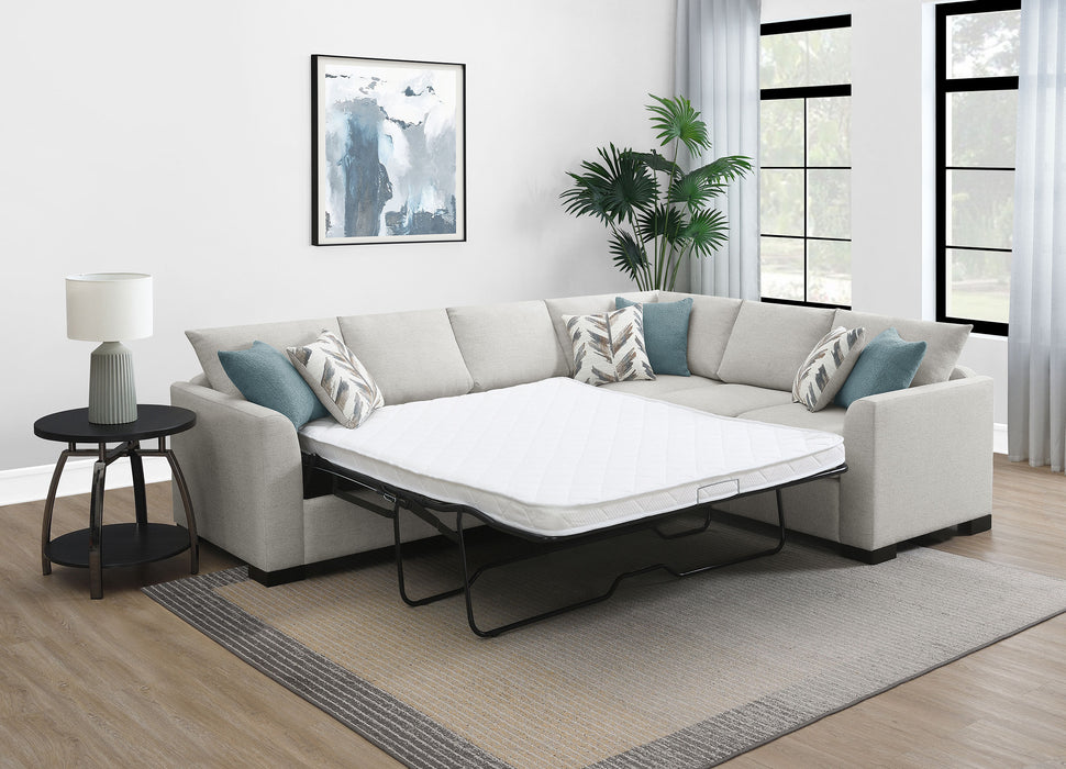 CoasterEveryday Ashford chenille upholstered sleeper sectional sofa in greige; angled view with chaise and cushions