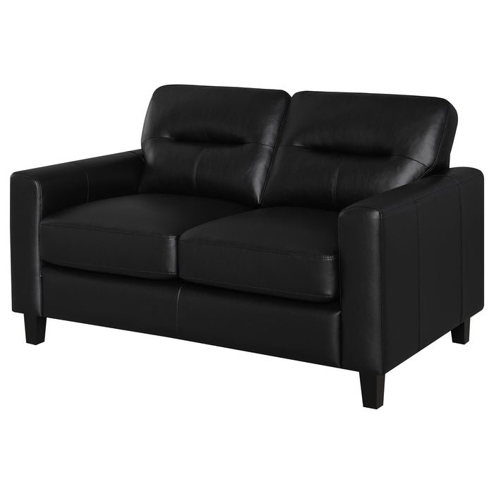 Black Scotland faux leather upholstered track arm loveseat with plush cushioning and modern design for stylish living room furniture.