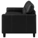 Black Scotland faux leather upholstered track arm loveseat by CoasterEveryday, showcasing plush cushions and sleek modern design.