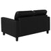 Black Scotland faux leather upholstered track arm loveseat from CoasterEveryday, featuring plush cushions and modern furniture design.
