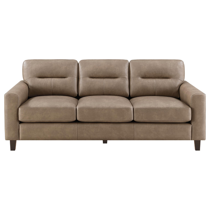 CoasterEveryday Scotland 3-piece brown faux leather upholstered sofa set in a modern living room setup
