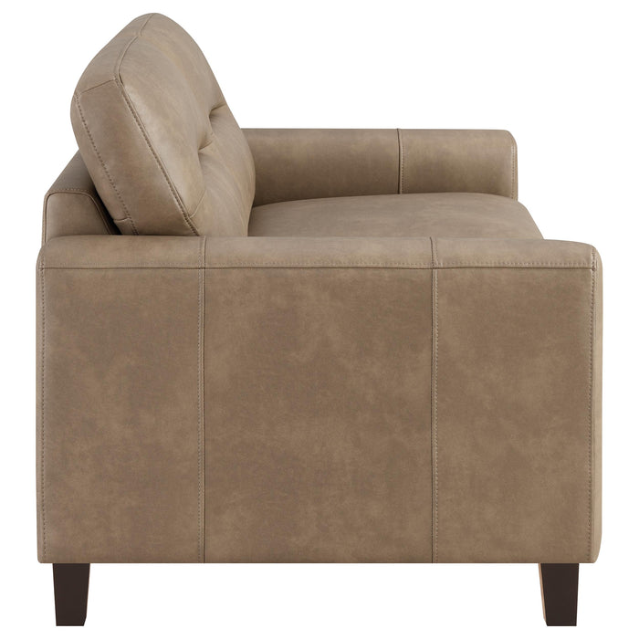 Brown Scotland faux leather upholstered track arm loveseat, cozy furniture piece with plush cushions and modern design.