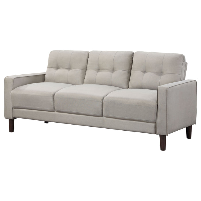 CoasterEveryday Bowen beige upholstered tufted sofa with track arms