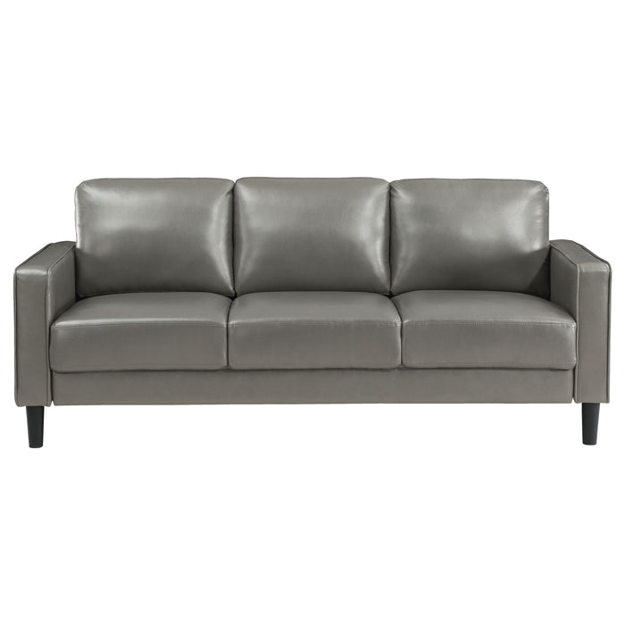 CoasterEveryday Ruth upholstered track arm sofa in grey fabric, front three-quarter view