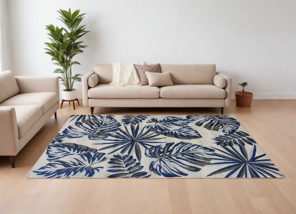 10' x 13' Machine Woven Tropical Leaves Indoor Area Rug - Gray Blue