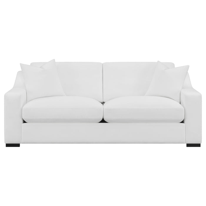 CoasterElevations Ashlyn 3-piece upholstered sofa set with sloped arms in white fabric, arranged in a living room setting.
