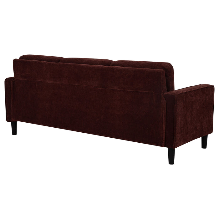 CoasterEveryday Ruth 77-inch rust red fabric upholstered sofa with track arms