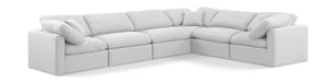 White linen Meridian Furniture Indulge 6-piece modular corner sectional sofa with stationary design and plush cushions.