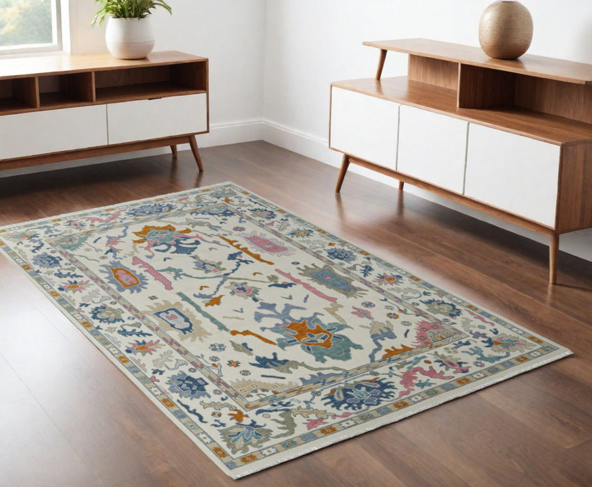 4' x 6' Wool Floral Hand Knotted Area Rug With Fringe - Blue Ivory And Pink
