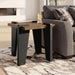 Rectangular cocktail table from Signature Design by Ashley® in dark wood finish, with a smooth tabletop and sturdy legs.