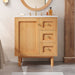 Giga bathroom vanity with sink, three drawers, soft-close door, natural wood finish, modern design, and sleek storage space.