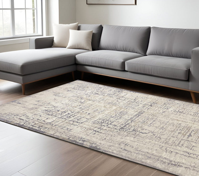 7' x 10' Abstract Stain Resistant Area Rug - Ivory And Gray