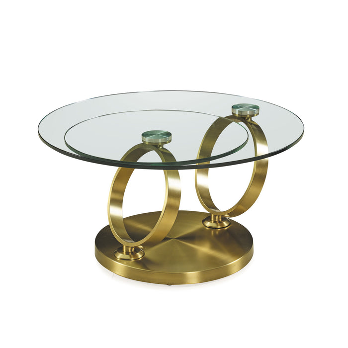 HomeRoots 32-inch round glass and gold metal abstract coffee table with clear glass top and modern design.