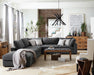 CoasterEssence Serene upholstered corner furniture in charcoal fabric with a soft, modern design