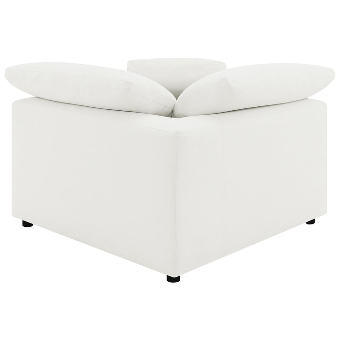 CoasterEveryday Raleigh boucle upholstered corner chair in ivory with a textured fabric finish