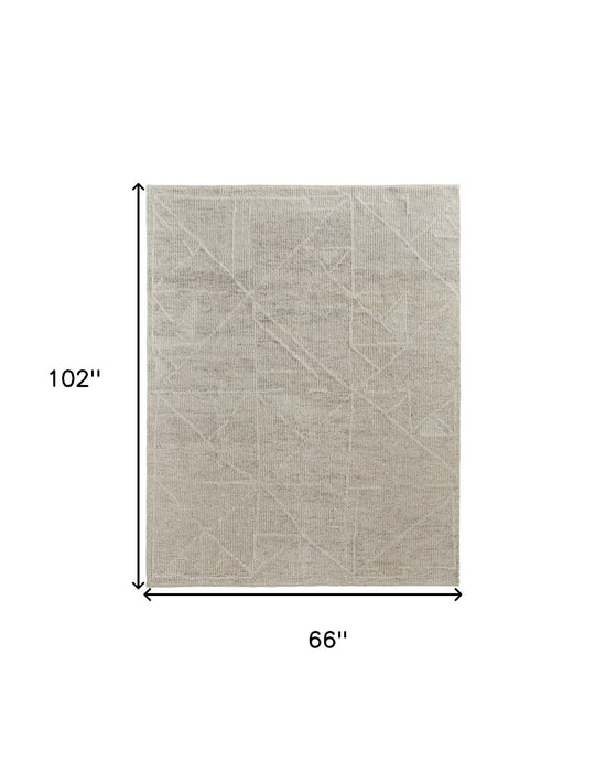 5.5' x 8.5' Wool Hand Knotted Area Rug - Tan And Ivory