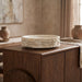 Marble bowl from Meridian Furniture's Caesar collection, showcasing a smooth, polished genuine marble surface for elegant tableware