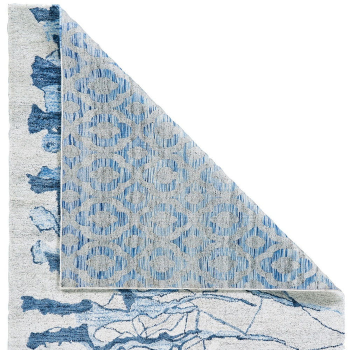 7' x 9' Abstract Hand Tufted Area Rug - Blue And Ivory