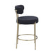 Set of 2 Giga modern Sherpa counter height barstools with brushed brass legs, upholstered seats, and low backs for kitchen or dining.