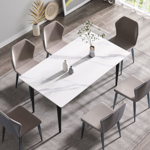 Modern 63-inch white artificial stone dining table with black metal legs, ideal for six people, by Giga.