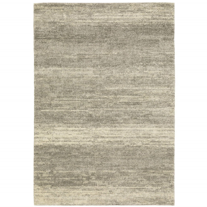 6' x 9' Abstract Power Loom Stain Resistant Area Rug - Gray Beige And Tan