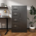Giga metal vertical filing cabinet with 4 drawers, lock, steel construction, suitable for school or office storage.