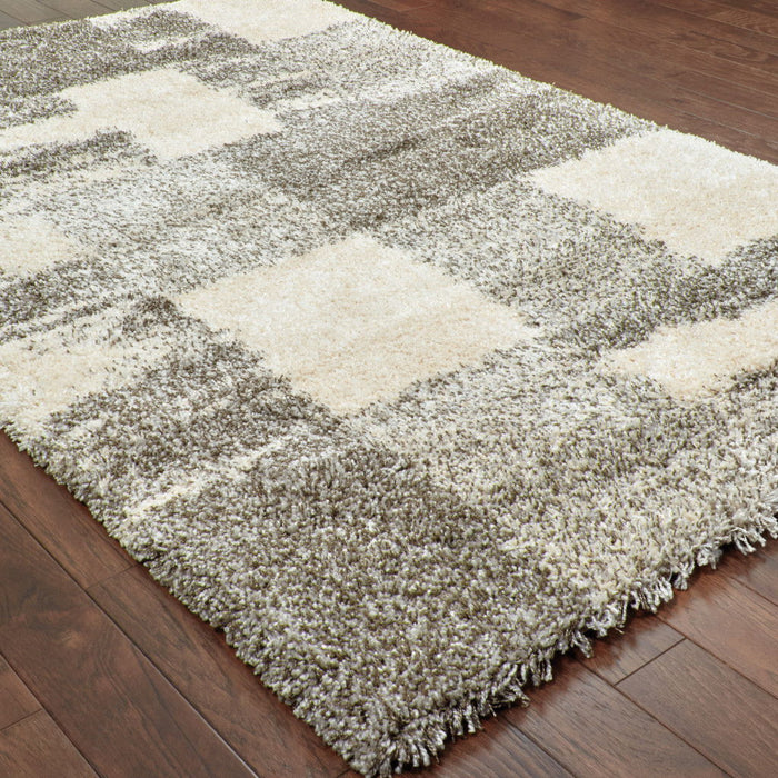 6' x 9' Geometric Shag Power Loom Stain Resistant Area Rug - Gray Ivory And Silver