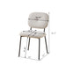 Modern 5-piece dining set with white table, four turquoise chairs with metal legs, space-saving design, Giga brand.