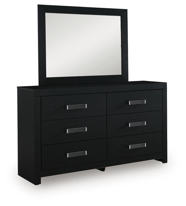 Signature Design by Ashley Maeling six-drawer dresser with sleek wood finish and modern handles, standing against a neutral wall.