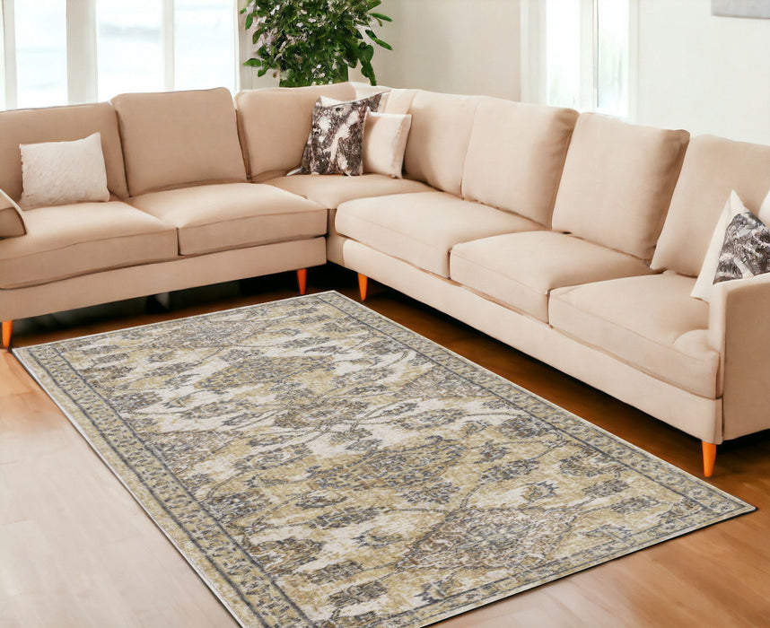 8' x 11' Machine Woven Bordered Floral Vines Indoor Area Rug - Ivory Sand