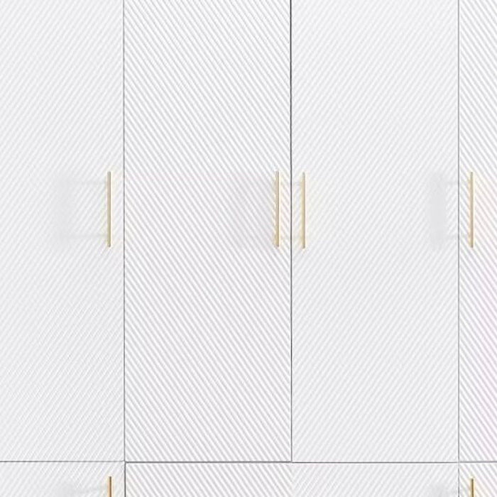White carved geometric six-door wardrobe with three drawers, 74-inch HomeRoots dresser, showcasing detailed design and storage space.