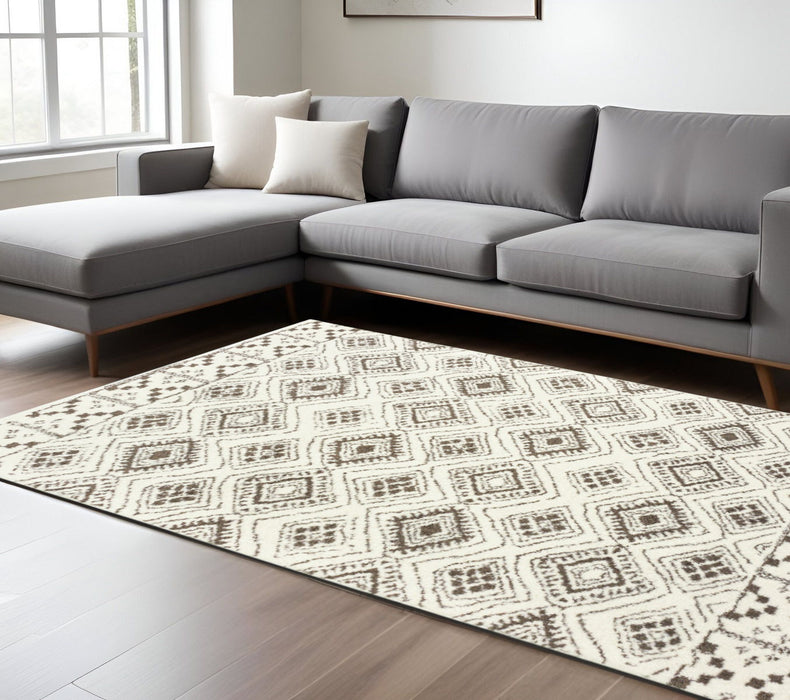 8' x 11' Geometric Shag Power Loom Stain Resistant Area Rug - Ivory And Brown
