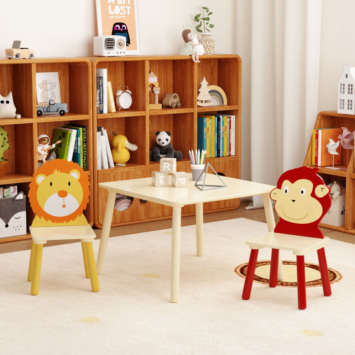 Kids wooden table and two chairs set by Giga featuring playful lion and monkey designs, ideal for toddler activity and play.