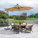 Giga 10 ft outdoor cantilever patio umbrella with taupe fabric, LED lights, metal frame, and easy open adjustment in a backyard setting.