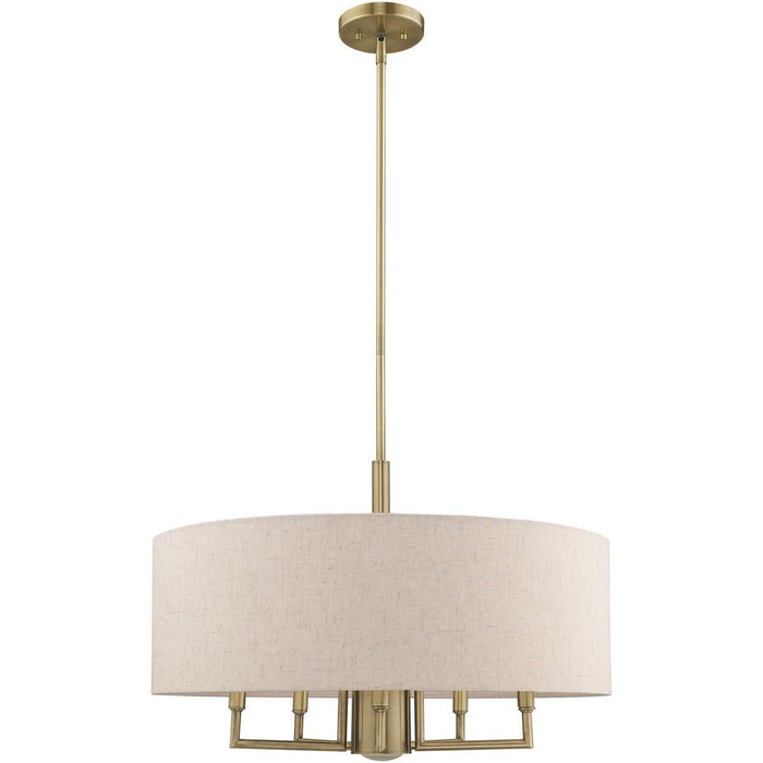 HomeRoots 25-inch six light dimmable chandelier with shades in antiqued brass finish, showcasing elegant lighting design.
