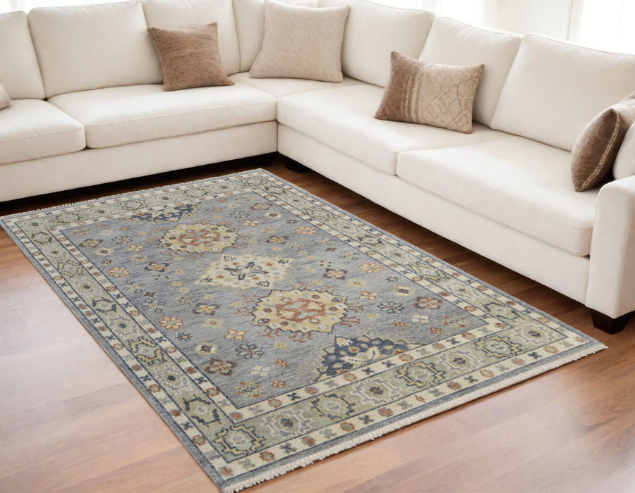 5' x 8' Wool Geometric Hand Knotted Area Rug With Fringe - Gray Blue And Taupe