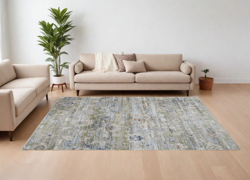 9' x 13' Floral Power Loom Worn Faded Area Rug - Ivory Green And Blue