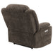 Dark brown upholstered power lift recliner chair from CoasterEveryday, showing plush cushioning and sturdy armrests.