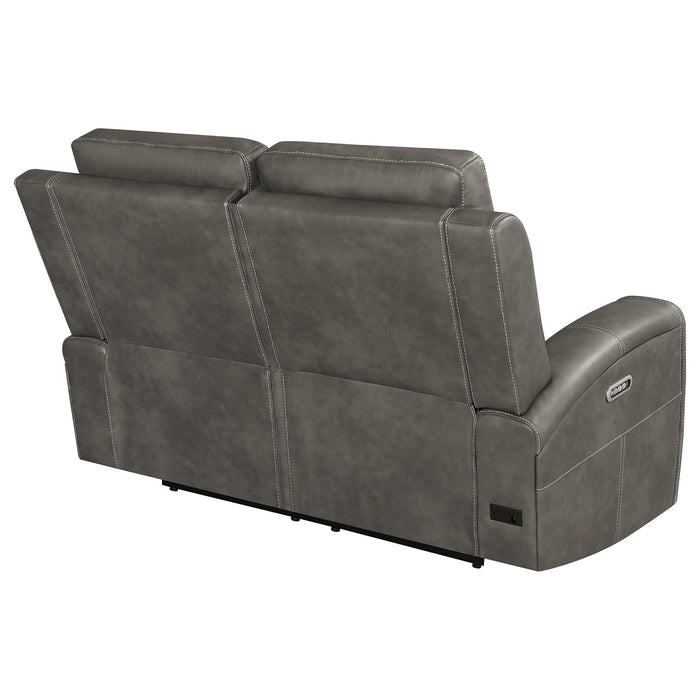 CoasterEveryday Brickston triple power reclining loveseat in charcoal upholstery with padded arms and cup holders