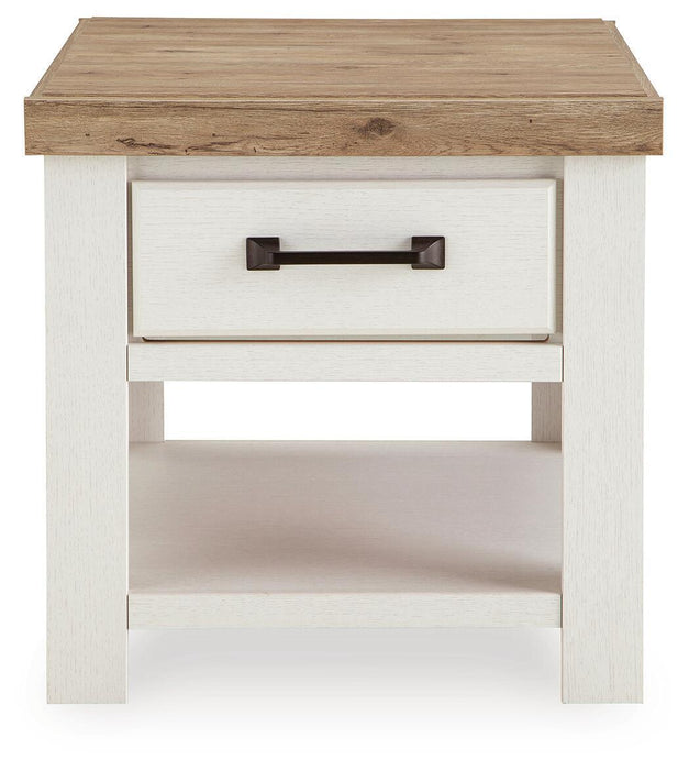 Rectangular cocktail table from Signature Design by Ashley, featuring a sleek wooden surface and modern design.