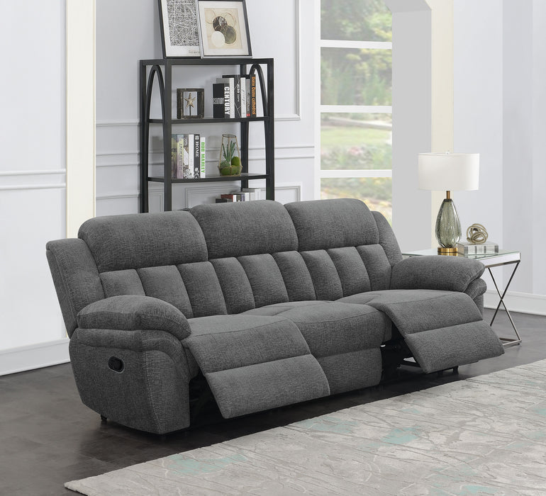 CoasterEssence Bahrain upholstered motion sofa in charcoal fabric with reclining seats